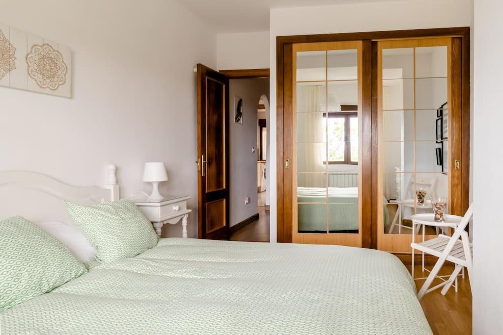 Casa De Las Flores - Apartamento Con Jardin Privado Frente A La Playa De Комильяс Экстерьер фото