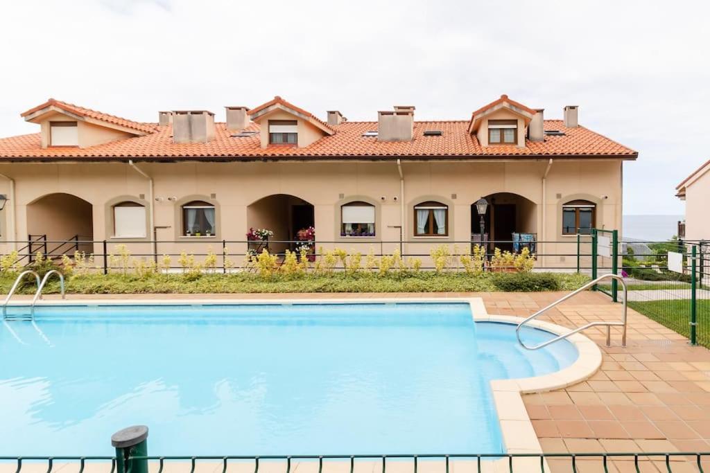 Casa De Las Flores - Apartamento Con Jardin Privado Frente A La Playa De Комильяс Экстерьер фото
